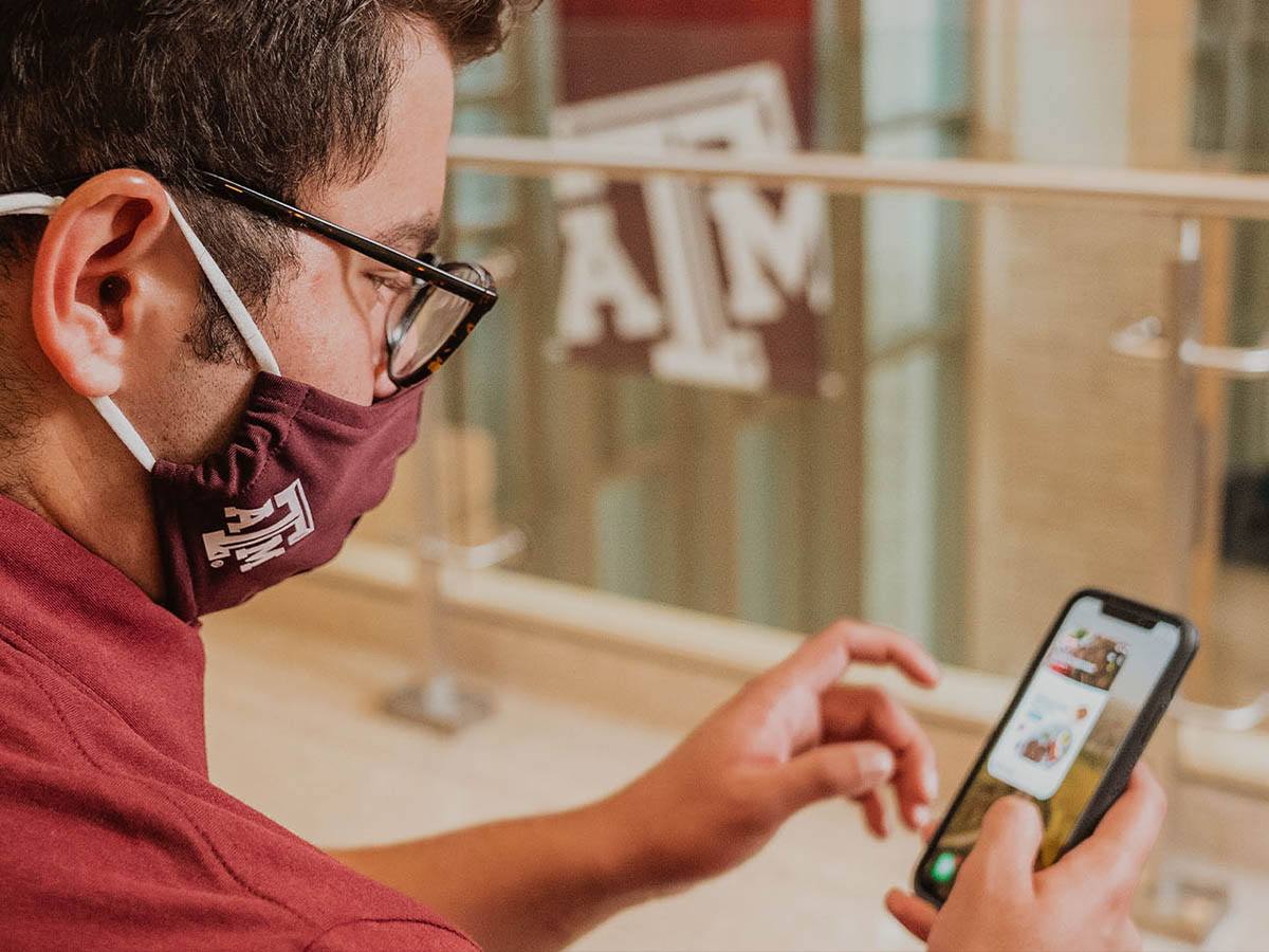 man ordering H-E-B groceries online